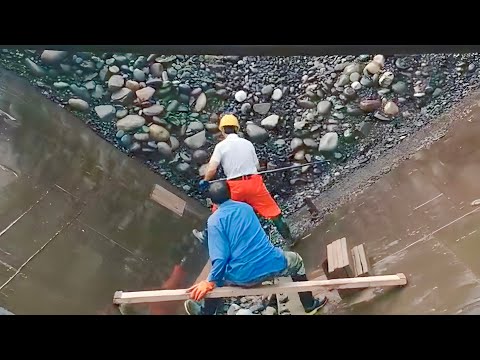 Barge unloads 3400 tons of large cobblestone in beautiful sunny weather - Relaxing video