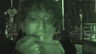 ANDY DICK amuses while eating hot dog