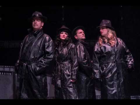 Adrift in Macao stage trailer image of a smoky nightclub with Lureena at the microphone