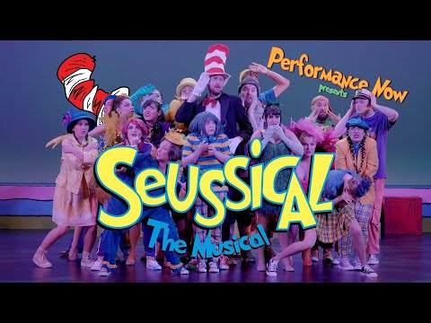 Trailer still: Cat in the Hat beckons JoJo toward a Seussian world of color