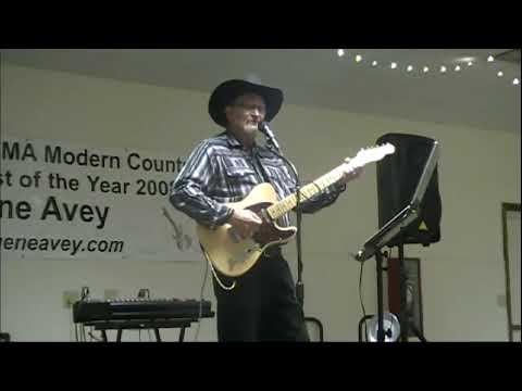 Gene Avey With Beer Bottle Brown