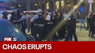 Chaos erupts outside Chicago police station after video released of deadly officer-involved shooting
