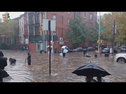 NYC streets submerged as torrential rain hits the city