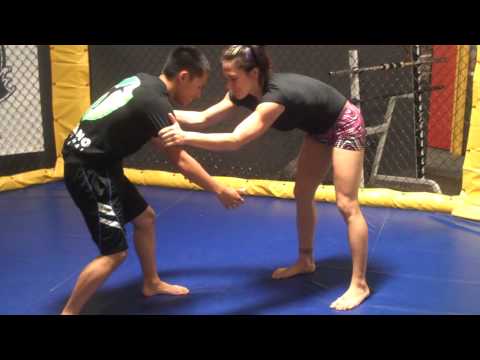 Cat Zingano demonstrates a few takedowns with Sai Michael Xiong