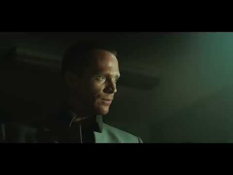 Legion (2010) official trailer frame: Archangel Michael steps into the desert diner with a duffel and rifles