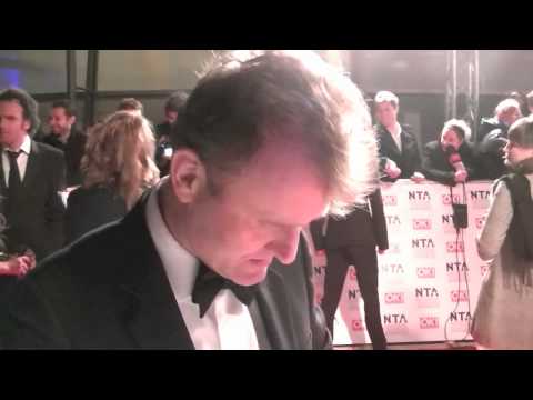 Hugh Dennis Signing Autographs At The National Television Awards 2012
