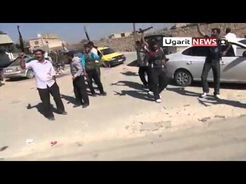 فرحة مقاتلي ألوية المعتصم بالله بعد السيطرة على مدينة كفرناها في ريف حلب