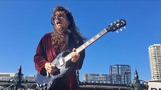 AC/DC - Whiskey On The Rocks Live | Angus Young street performer! | No Bull