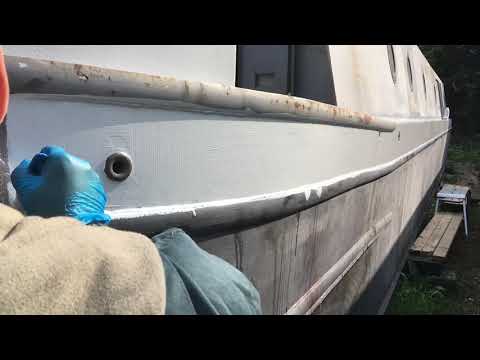 49. Painting continues on the narrowboat