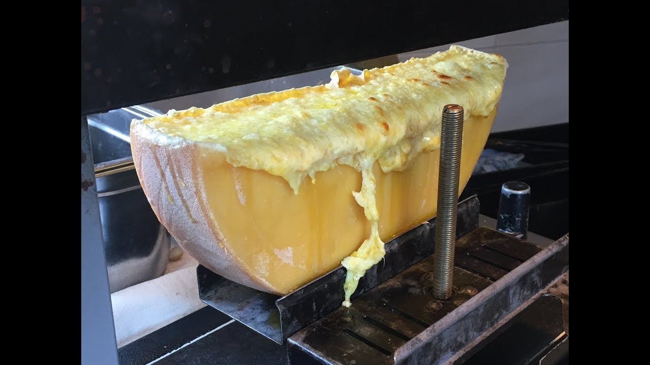 SWISS RACLETTE ..WARM MELTED SWISS CHEESE & BOILED POTATOES