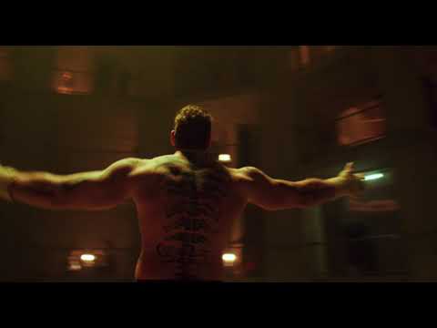 Thumbnail of the video: Knuckledust - The Big Guy - starring Moe Dunford