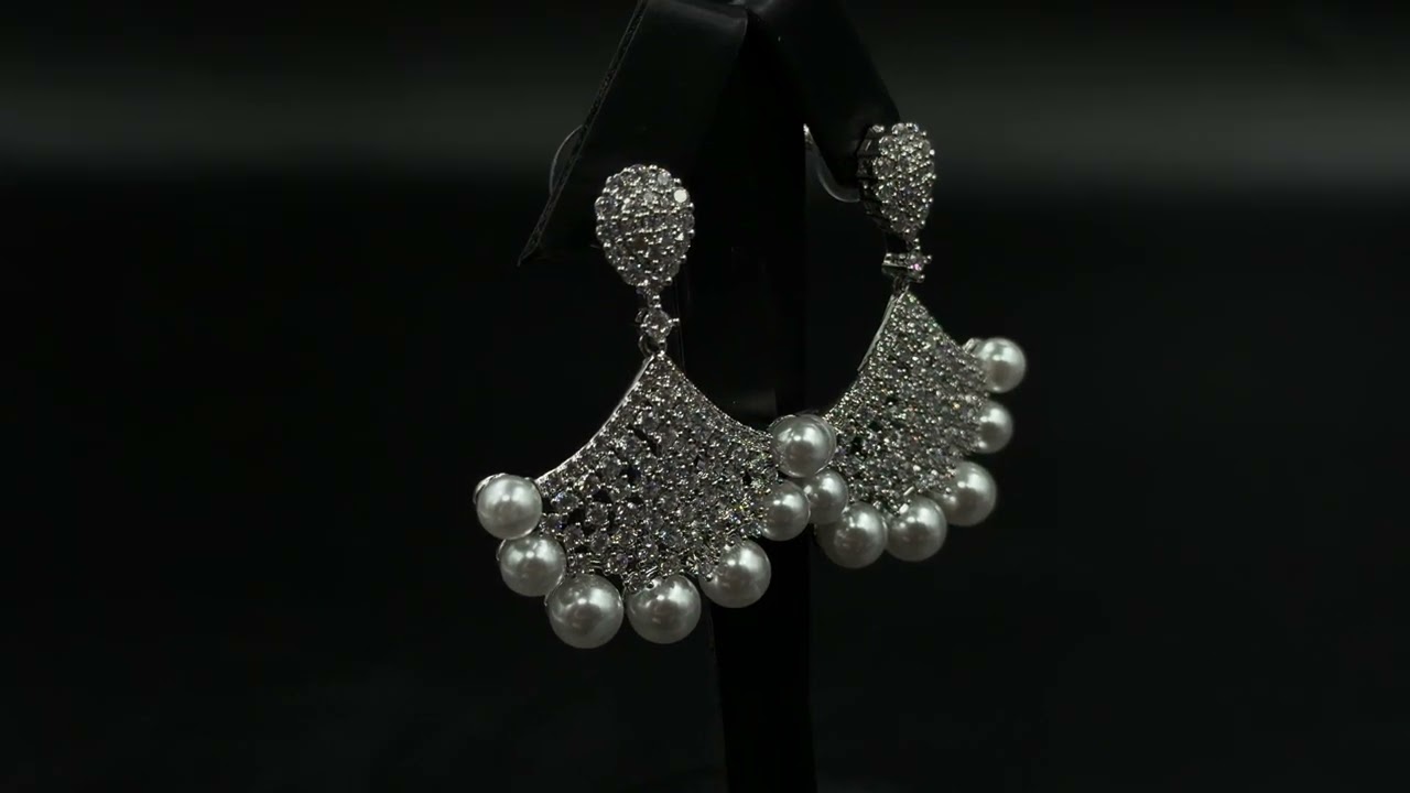 Dangle earrings adorned with pearl beads