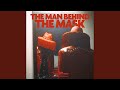 THE MAN BEHIND THE MASK