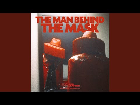 THE MAN BEHIND THE MASK