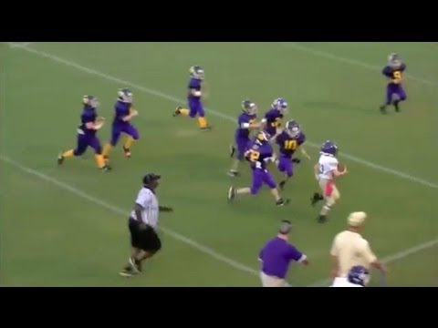 Alabama pee-wee QB trucks defender, wows on TD run