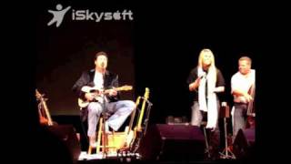 Rachel Holder singing with Vince GIll