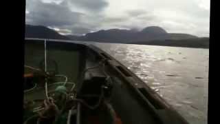 Spin in an ex-army MOD Raider at Scoraig jetty, Scottish Highlands