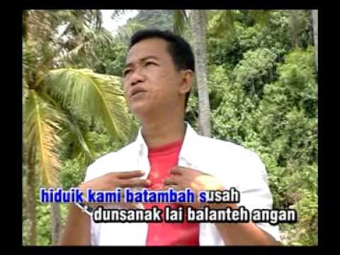 lagu minang Tongga Babeleang " Dedy Agam"