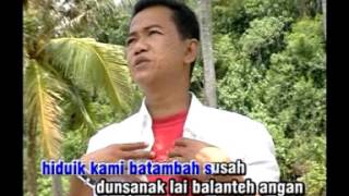 Download lagu lagu minang Tongga Babeleang ' Dedy Agam' mp3