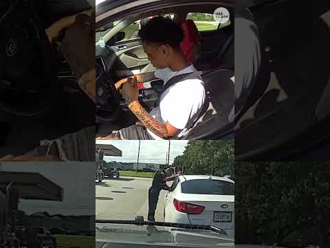 Video shows Georgia officer dragged by car during stop