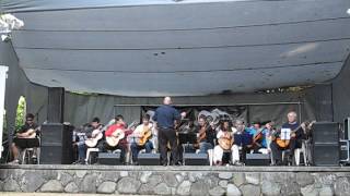 Classical Guitar orchestra play Hillbilly Child (theme from Country Calendar)