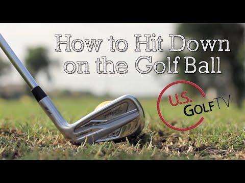 Part of a video titled How to Hit Down on the Golf Ball With Irons - YouTube