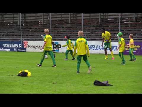 Emile Paul Tendeng playing with kids after match