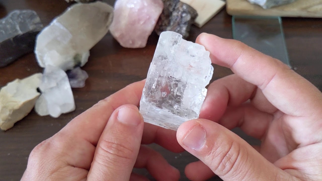 What is the crystal system of halite?