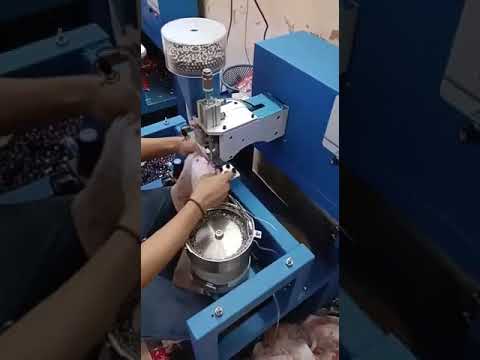 Attaching Machine
