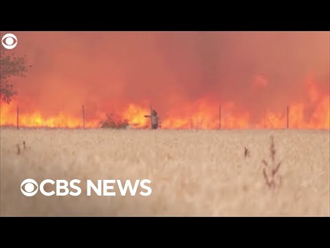 Man caught in wildfire escapes with clothes ablaze