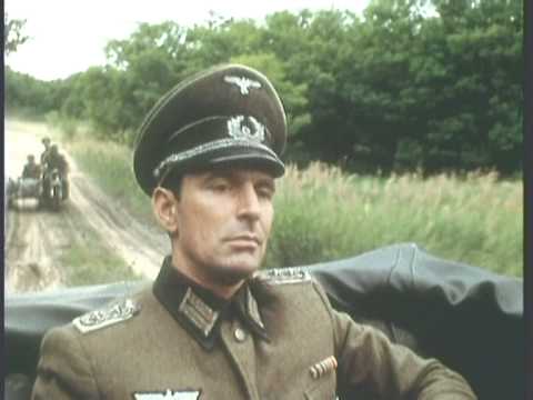 action on the road: German officer captured; his guard killed