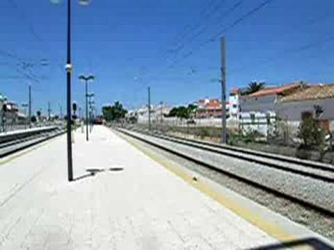 CP1900 com 6 vagoes de areia Estaçao Tunes