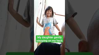 MY DAUGHTER TRIES TO MASSAGE HER DADDY BY GENTLY STEPPING ON MY BACK #massage #daughter #kids #short