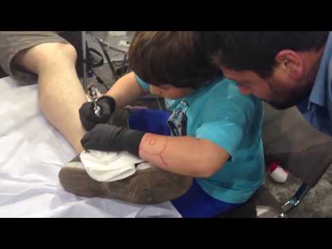 Niko Tsan (8 years old ) doing his 2nd tattoo