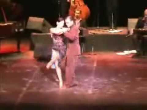  Esteban Moreno  and  Claudia Codega  are  dancing  to  the  tango  "  Zum  "