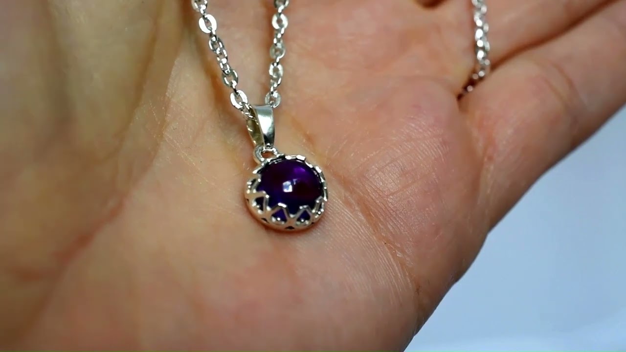 Sterling silver pendant with natural Ametyst.