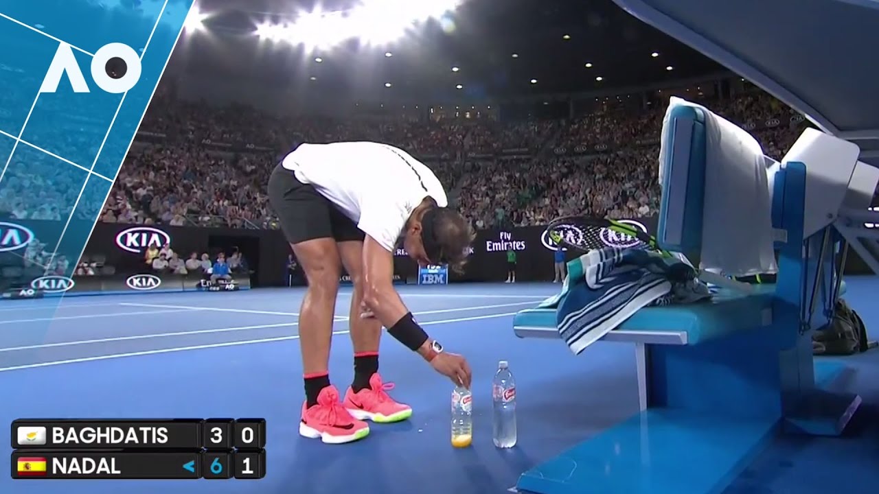 What does Nadal do with water bottles?