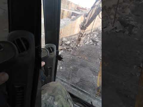 Обзор экскаватора погрузчика Caterpillar 434 с гидромолотом