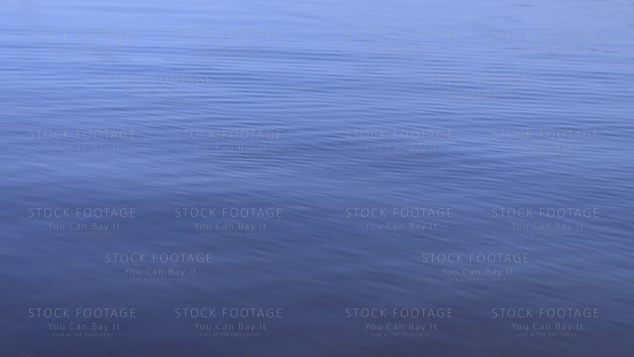 Sea water texture background. Calm sea with small waves and ripple top view.
