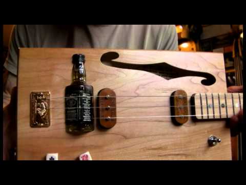 JACK DANIELS BOTTLE BRIDGE 3 STRING CIGAR BOX GUITAR BY JUNKSVILLE