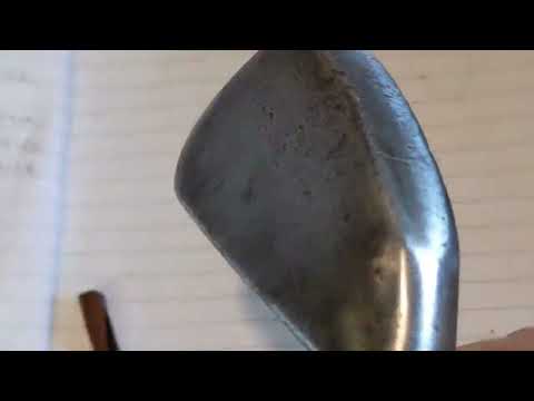 Will it be a rare one? Cleaning an old hickory golf club.