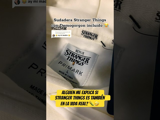 Vídeo relacionado con Stranger Things Newspaper Demogorgon Sighting Camiseta Unisex de Manga Larga, Blanco, L