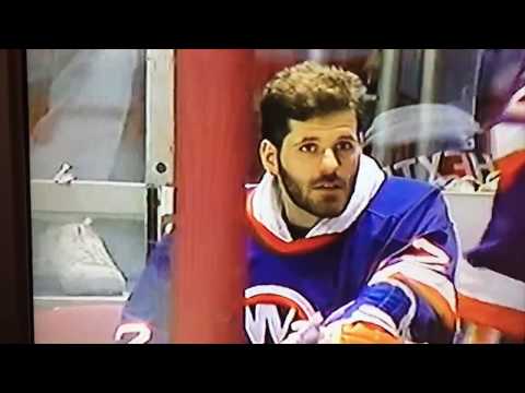 Hextall catches the puck on the bench