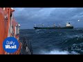 Helicopter Rescue Sick Seaman Winched To Safety In Rough Seas Daily Mail