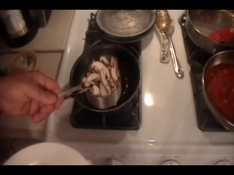 Chilean sea bass with mushrooms and tomato sauce