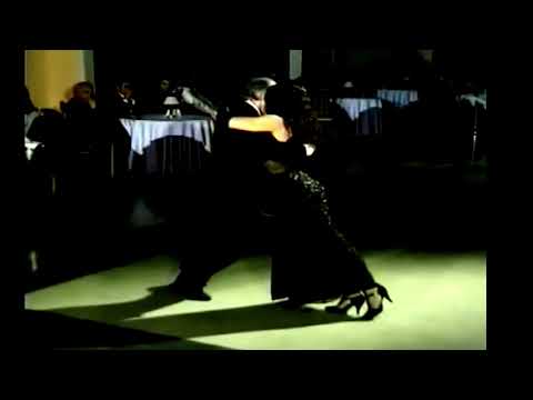  Carlos Gavito  and  Marcela Duran  are  dancing  to  the  tango  "  A Evaristo Carriego  "  by  Osvaldo Pugliese