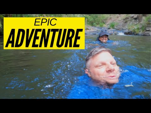 Exploring the Base of a Stunning Waterfall