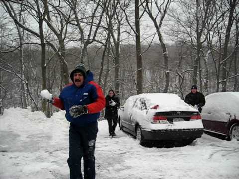 Funny snowball fight with fall