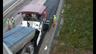 preview picture of video 'M8 motorway Ireland construction video - Blacktop being laid'