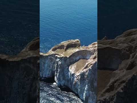 Kicker Rock (León Dormido) in the Galápagos Islands, Ecuador—gliding over cliffs and Pacific waters